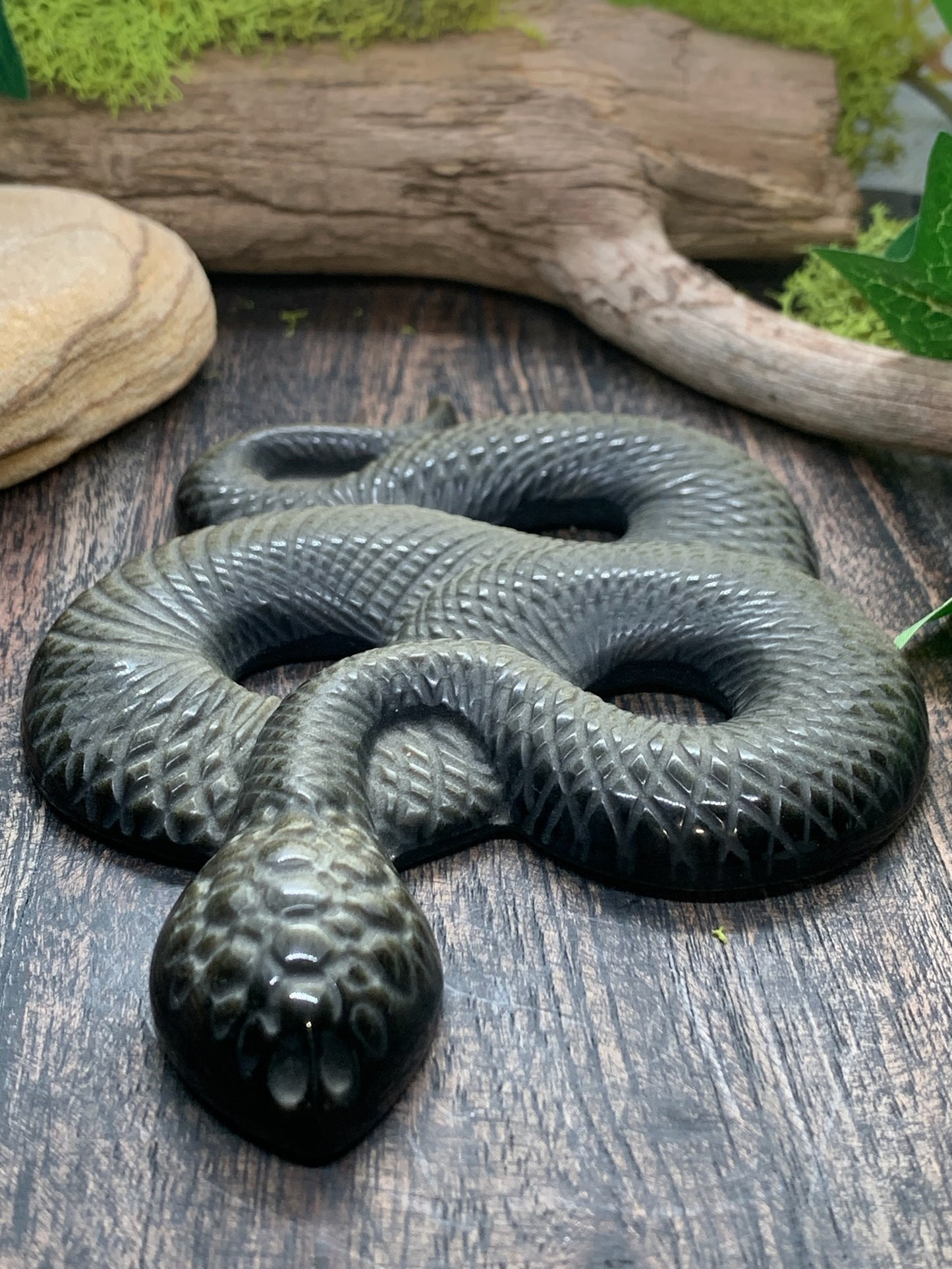 Golden Obsidian Snake Carving