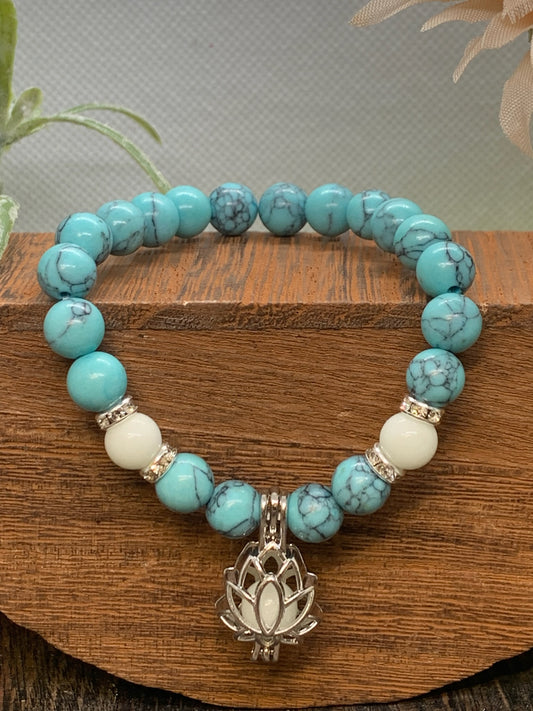 Turquoise Blue Howlite Bracelet with Lotus Charm and UV Beads