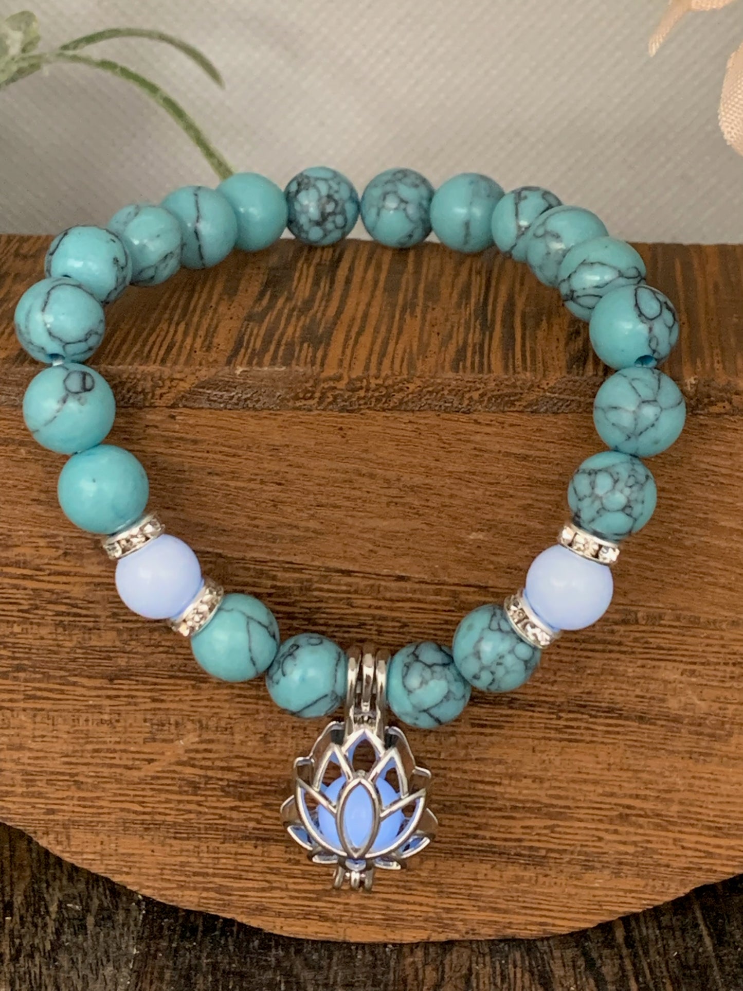 Turquoise Blue Howlite Bracelet with Lotus Charm and UV Beads