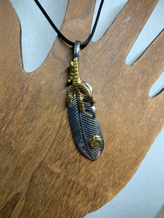 Feather Pendant on cord necklace